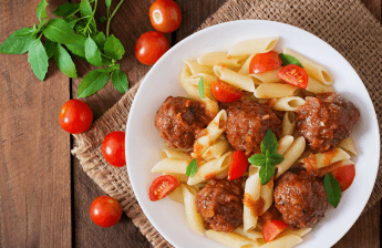 penne-pasta-with-meatballs-tomato-sauce-white-bowl (1) 1